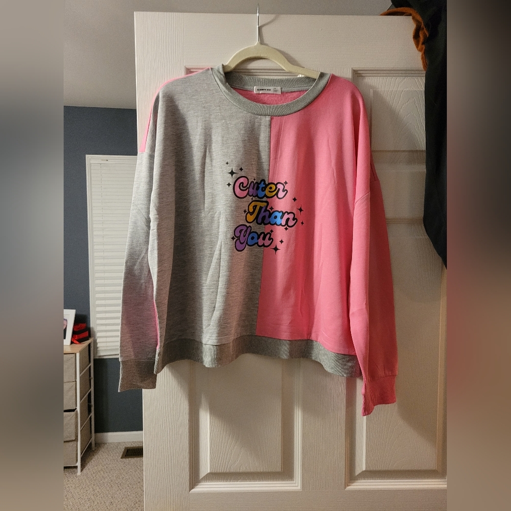 Slightly cropped light sweater